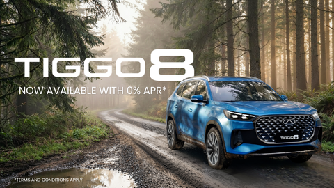 Blue Chery Tiggo 8 Driving Down Muddy Road 
