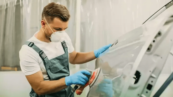 Aftersales Colleague Buffing a Chery Vehicle