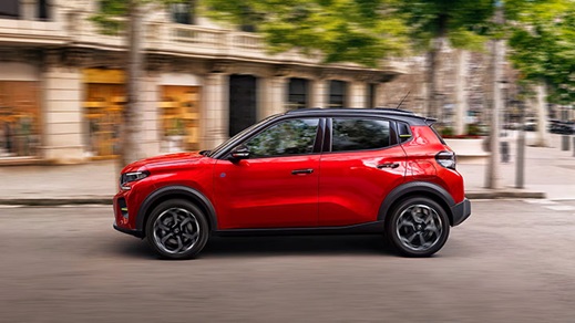 Red Citroen C3 Side Driving