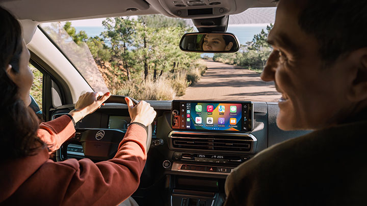 Interior Shot of Woman Driving Citroen Holidays