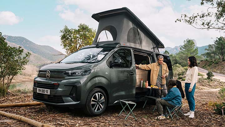 Family Sitting Outside Citroen Holidays