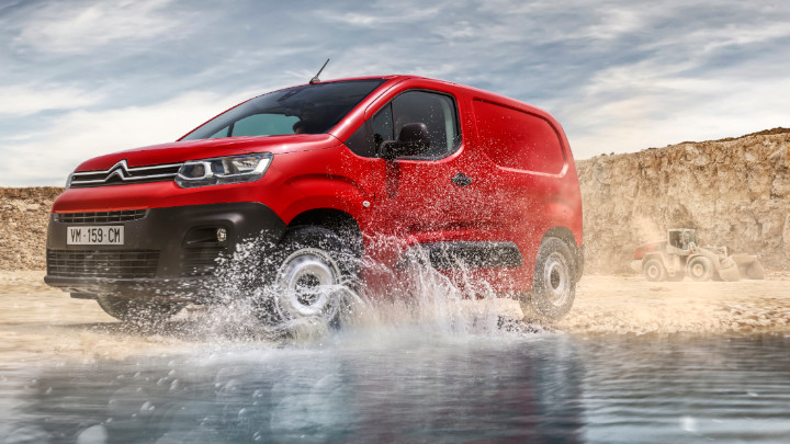 Red Citroen Berlingo Exterior Front Going Through a Water Splash