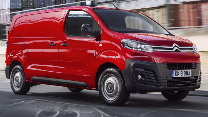 Red Citroen Dispatch Exterior Front Driving in Urban Area