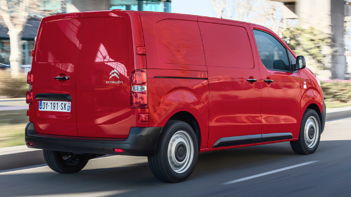 Red Citroen Dispatch Exterior Rear Driving in Urban Area