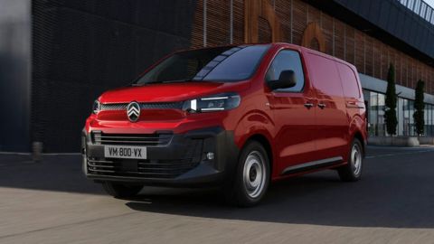 Red Citroën Dispatch driving in a city