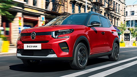 Red Citroen e-C3 Van Driving On Road