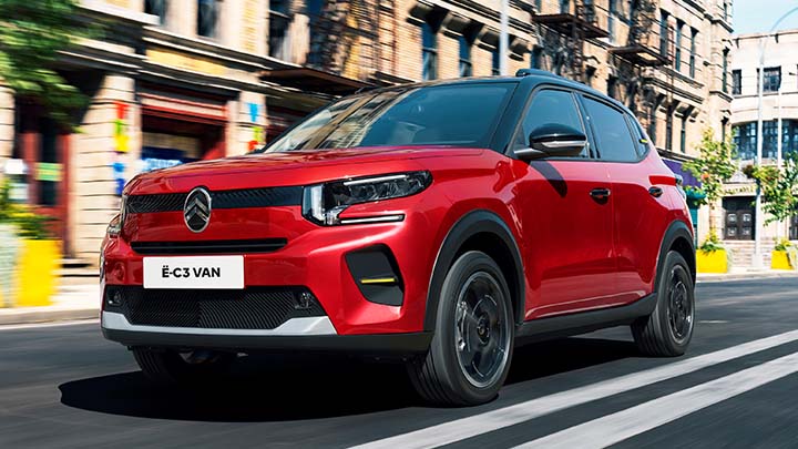 Red Citroen e-C3 Van Driving On Road