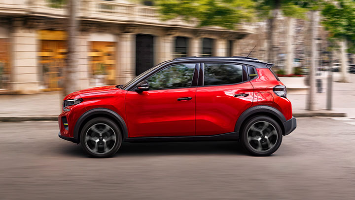 Red Citroen e-C3 Van Driving On Road