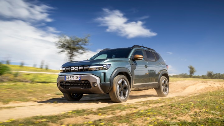 Blue Dacia Duster Exterior Front Driving Off-Road