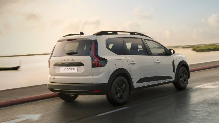 White Dacia Jogger Exterior Rear Driving
