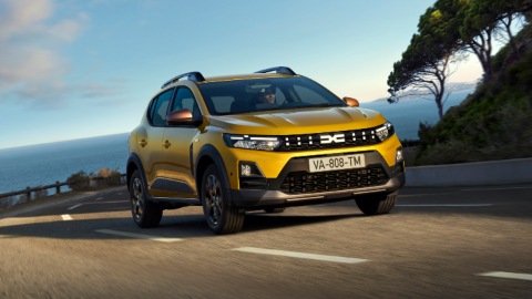 Yellow Dacia Sandero Stepway Exterior Front Driving