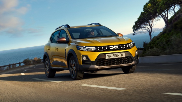 Yellow Dacia Sandero Stepway Exterior Front Driving