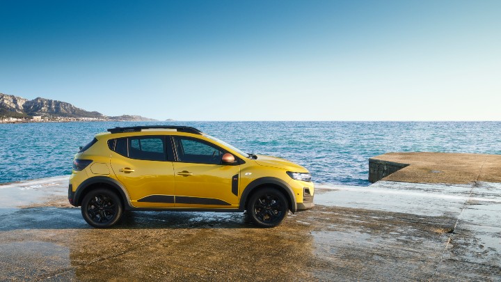 Yellow Dacia Sandero Stepway Exterior Side Static Coast
