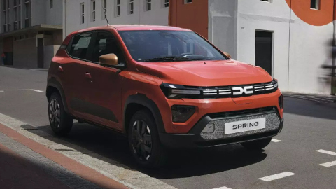 Red Dacia Spring Parked On Road