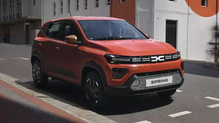Red Dacia Spring Parked On Road