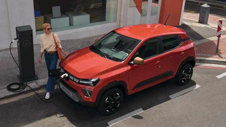 Red Dacia Spring Roadside Charging