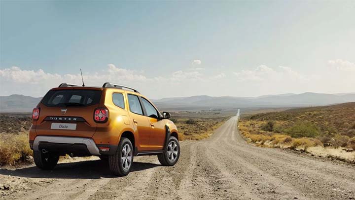 orange dacia duster in the desert