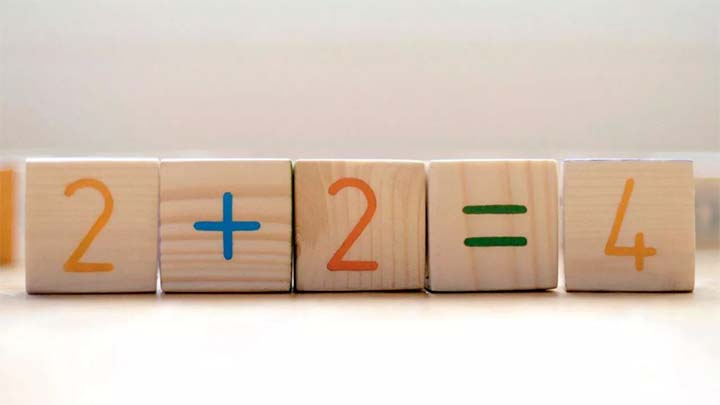 wooden blocks with simple maths sum