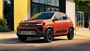 Red Dacia Spring Parked On Road