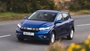 Blue Dacia Sandero Journey Model Driving On Road