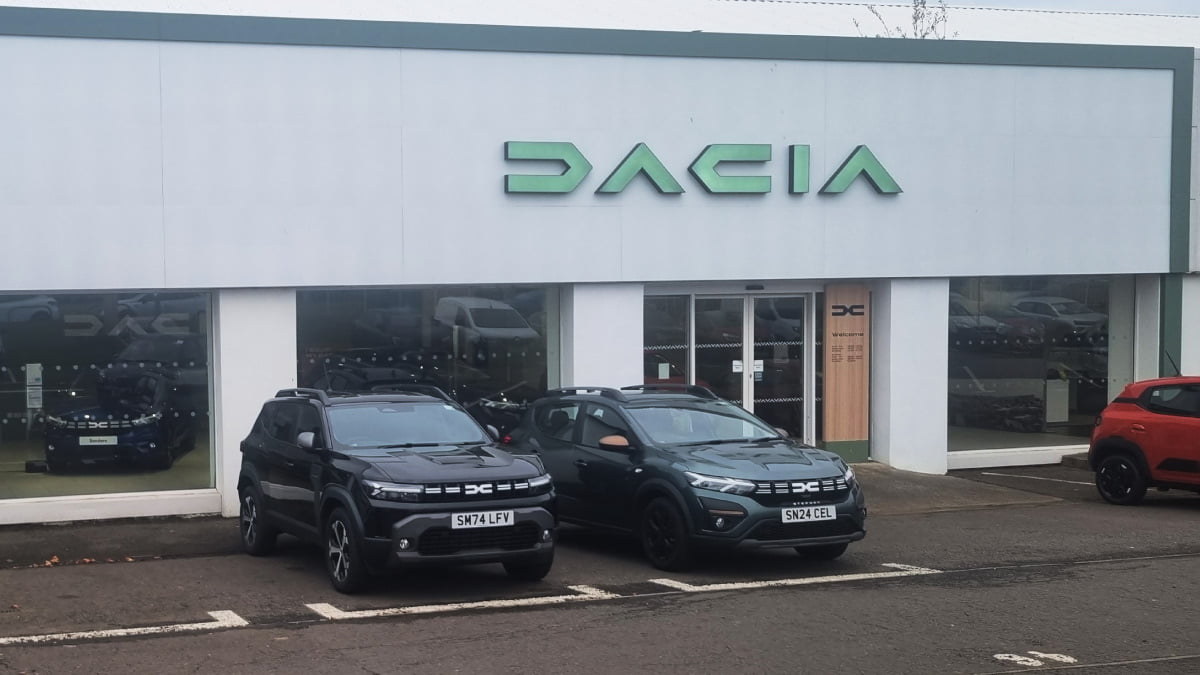 Dacia Edinburgh exterior with two vehicles in front of entrance