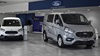 A white and grey van lined up inside Evans Halshaw Ford Lincoln dealership