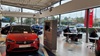 Cars inside the Vauxhall Bedford showroom