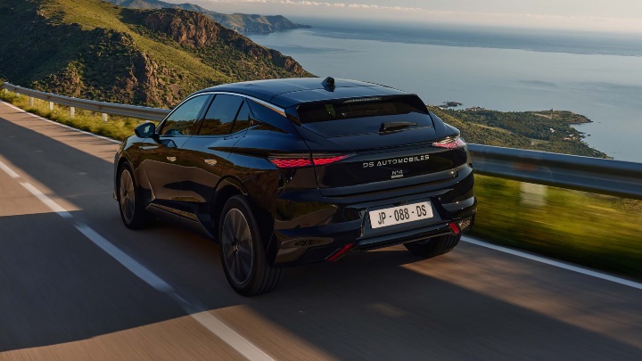 Black DS No4 E-TENSE Exterior Rear Driving Near Coast