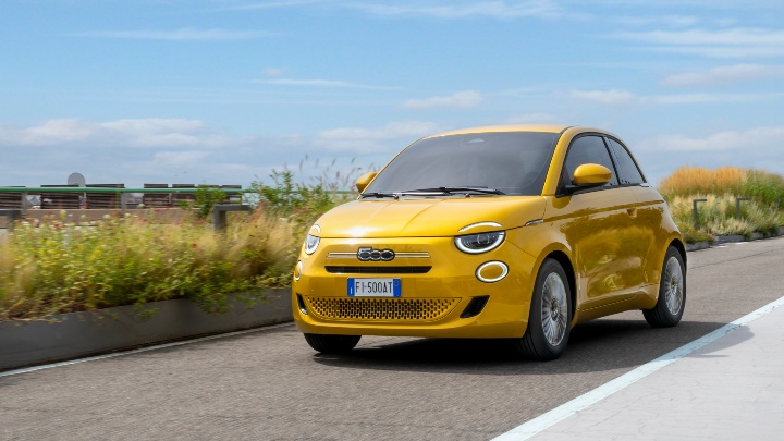 Fiat 500 hybrid driving yellow front