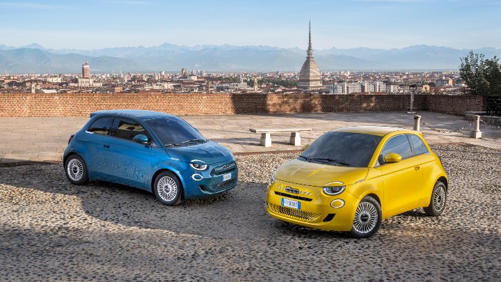 Fiat 500 Hybrid pair yellow and blue outside italian city