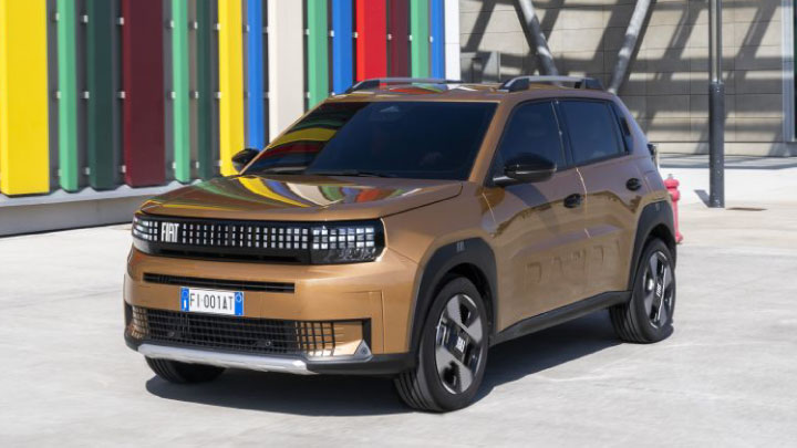 Hybrid Fiat Panda parked in front of a colourful wall