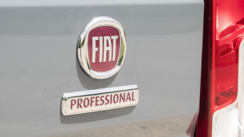 Silver and Red Fiat Professional Badge