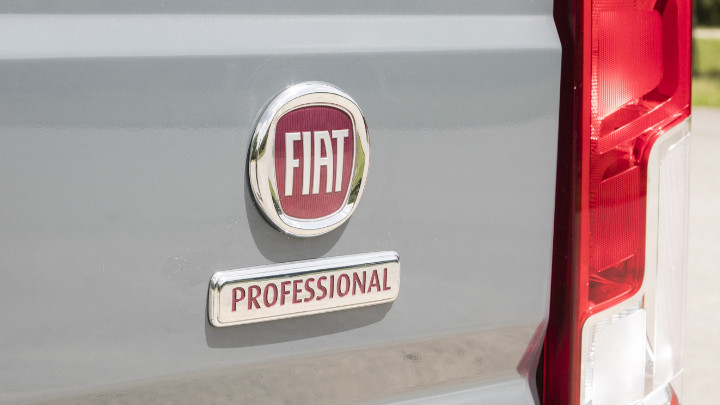 Silver and Red Fiat Professional Badge
