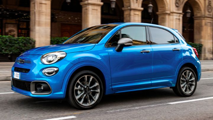 Blue Fiat Driving in the city