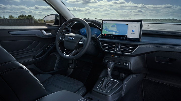 Blue Ford Focus, interior SYNC 4 shot