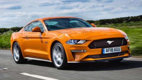 Orange Ford Mustang Exterior Front Driving