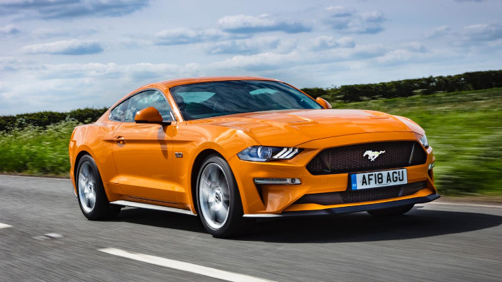 Orange Ford Mustang Exterior Front Driving