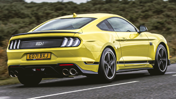 Yellow Ford Mustang Mach 1 Exterior Rear Driving