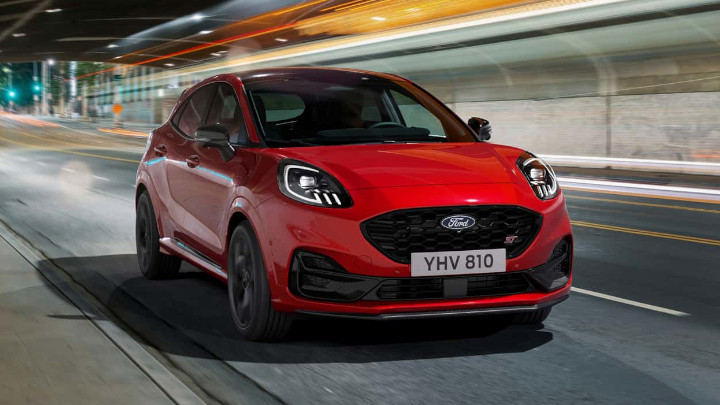 Red Ford Puma ST Mild Hybrid Front Driving On Road