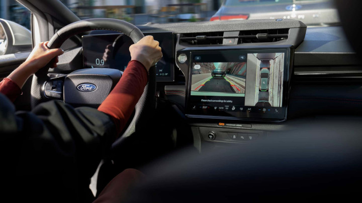 Ford Puma ST Interior With Person Driving and Infotainment Screen