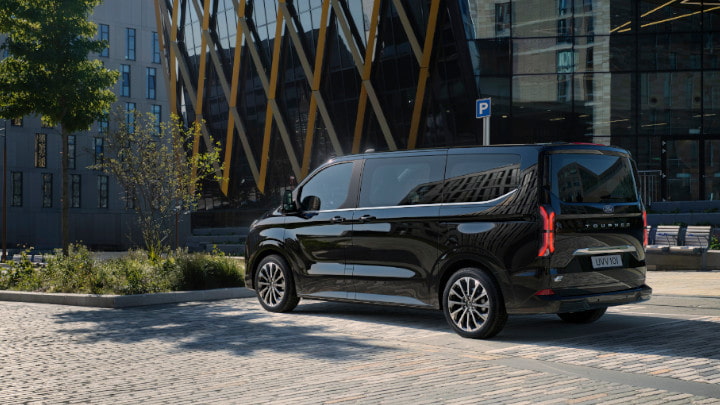 Black Ford Tourneo Custom Exterior Rear in Urban Area