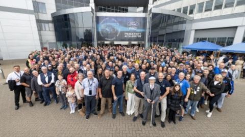 Participants of the 201 vehicles convoy that helped set new Guiness world record standing in front of the Evans Halshaw Ford Bedford Transit Centre