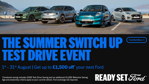 Four Ford Vehicles Parked In Car Park With Promotional Messaging Below