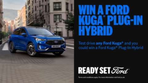 Blue PHEV Ford Kuga in a city. Win a Ford Kuga Plug-In Hybrid promotion