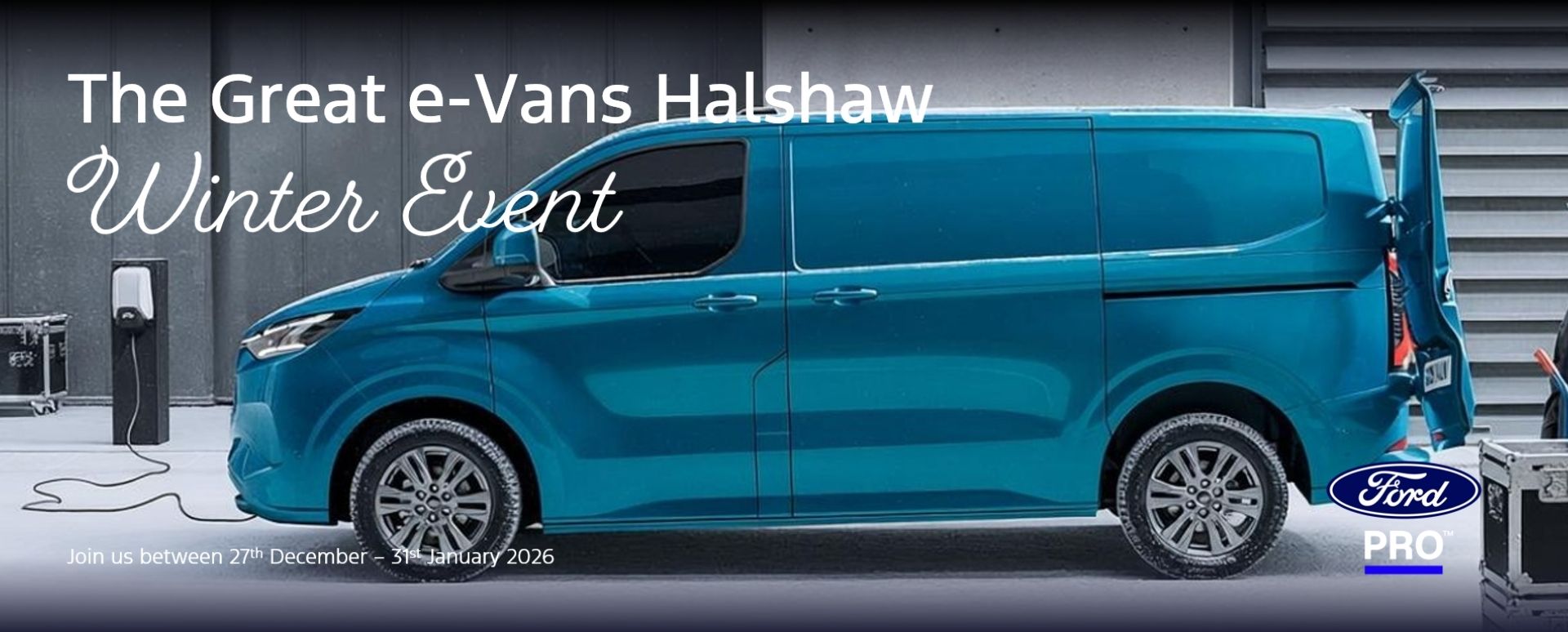 Blue Ford Van Parked Up Charging Side View