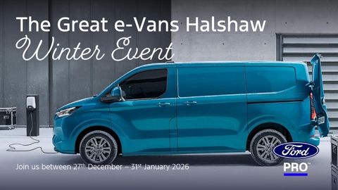 Blue Ford Van Parked Up Charging Side View