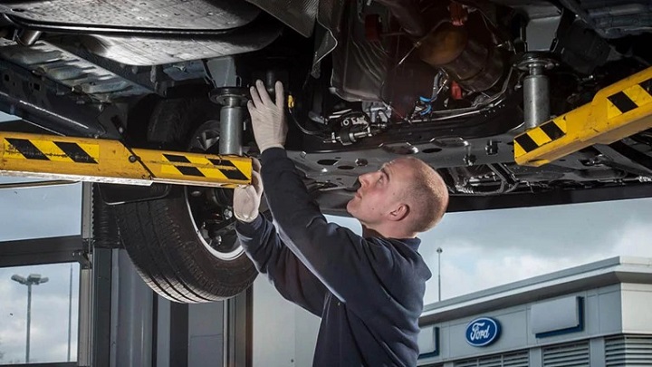 Ford Technician performing repair