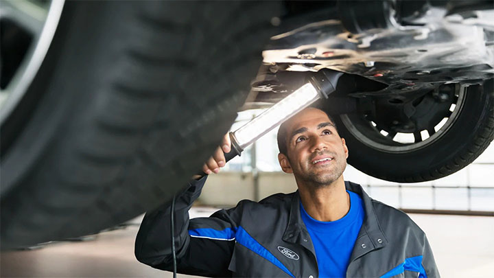 Ford technician performing a vehicle health check