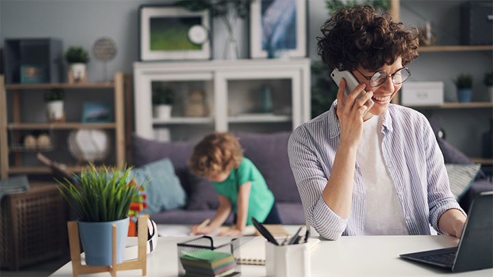 Mother booking Ford service from home desk
