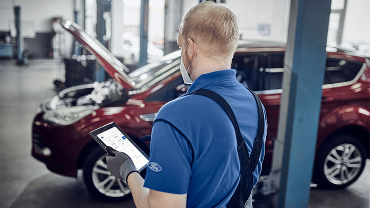 Ford technician performing visual health check